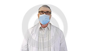 Doctor in medical mask against Coronavirus Covid-19 breathing heavily on white background.