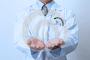 Doctor, medical professional holding something in empty hand