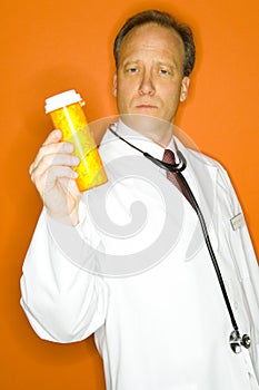 Doctor with medicine bottle