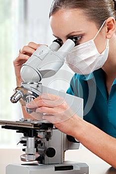 Doctor with microscope