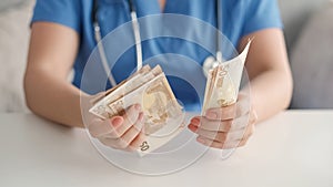 Doctor money healthcare income euro banknotes cash