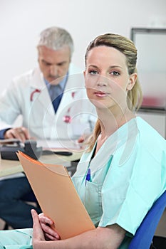 A doctor and a nurse