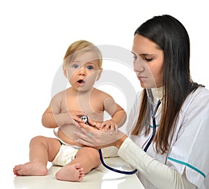Doctor or nurse auscultating child baby patient heart with stethoscope physical therapy