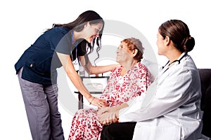 Doctor and Nurse consulting Senior Patient