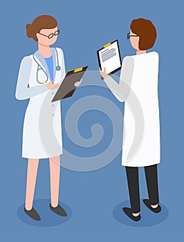Doctor and nurse discussing together on medical exam at hospital. Two women medic meeting