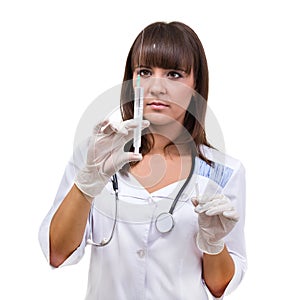 Doctor or nurse in face mask and lab coat holding syringe. Isolated over white.