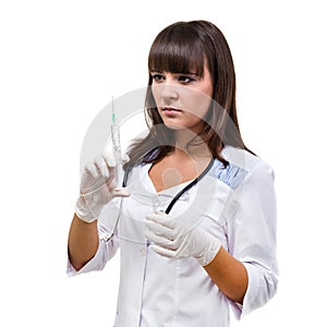 Doctor or nurse in face mask and lab coat holding syringe. Isolated over white.