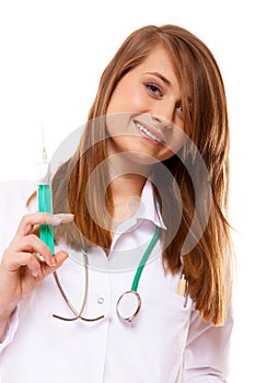 Doctor or nurse holds a syringe, healthcare concept