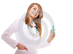 Doctor or nurse holds a syringe, healthcare concept