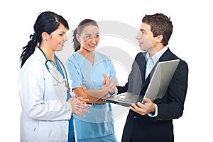 Doctor ,nurse and IT person man photo