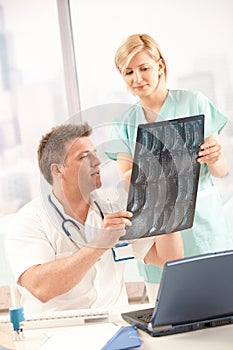 Doctor and nurse with x-ray image