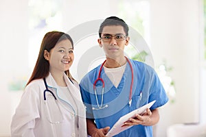 Doctor or nurse with stethoscope and face mask