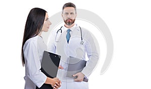 doctor with nurse in studio with copy space. photo of doctor and nurse wear white coat.