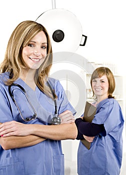 Doctor and nurse in white hospital