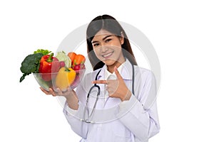 Doctor or nutritionist holding fresh fruit Orange, red and green apples and smile in clinic. Healthy diet Concept of nutrition