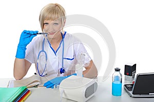 Doctor in the office behind a desk. photo