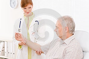 Doctor office - female physician examine patient photo