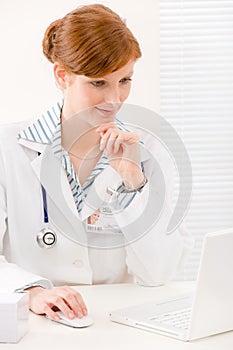 Doctor office - female physician work computer