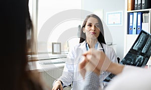 Doctor office at patient reception barely holds back