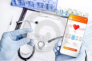 Doctor online medical application. Doctor holding digital smartphone. Healthcare medicine app on mobile phone screen