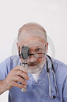 Doctor with ophthalmoscope