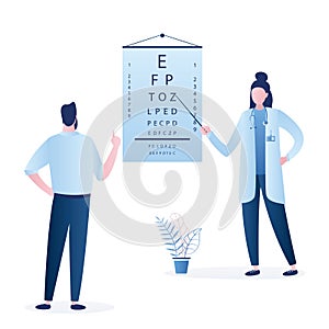 Doctor optometrist checks vision in a male patient. Eye test chart. Vision test. Optical exam. Healthy sigh