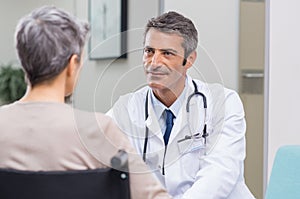 Doctor patient consultation photo