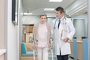 Doctor and patient with crutches