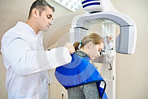 Doctor and patient, dentistry, dental tomograph