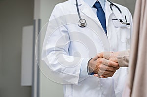 Doctor patient handshake