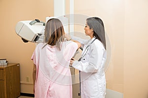 Doctor and patient during mammogram