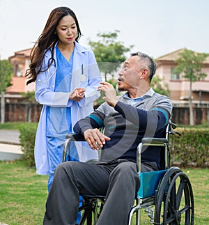 Doctor and patient in medical discussion on digital tablet