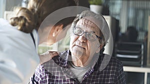 Doctor with patient in medical office