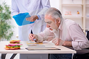 Doctor and patient suffering from Alzheimer disease