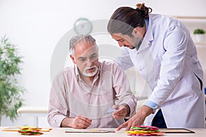 Doctor and patient suffering from Alzheimer disease