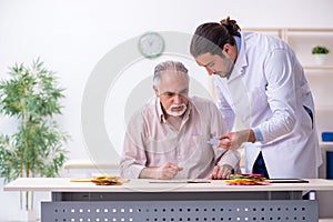 Doctor and patient suffering from Alzheimer disease