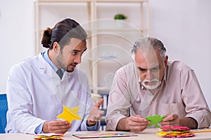 Doctor and patient suffering from Alzheimer disease