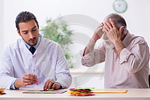 Doctor and patient suffering from Alzheimer disease