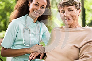 Doctor and patient on wheelchair