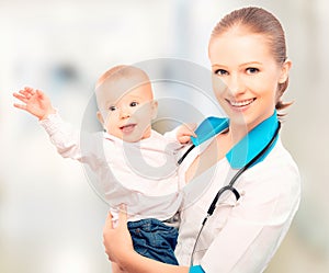 Doctor pediatrician and patient happy child baby