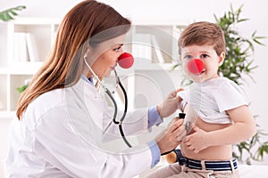 Doctor pediatrician and patient happy child