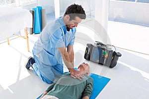 Doctor performing resuscitation on patient