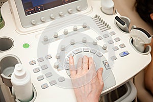 Doctor performing an ultrasound examination