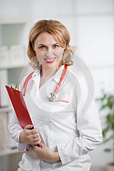 Doctor or physician in her office