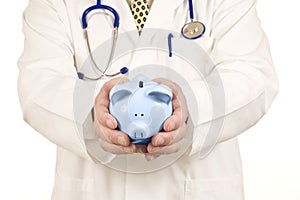 Doctor With Piggy Bank in Both Hands