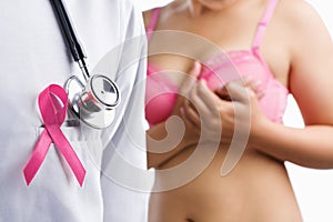 Doctor with pink badge and woman on bra