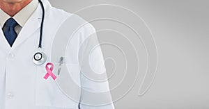 doctor with pink breast cancer awareness 3d ribbon