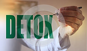 Doctor pointing word Detox with marker, Medical concept