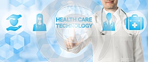 Doctor Points at HEALTH CARE TECHNOLOGY and Icons