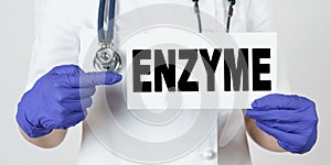 The doctor points his finger at a sign that says - ENZYME